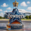 Dallas Cowboys 5x Super Bowl Champions Whiskey Bottle in a star shape featuring a detailed gold crown bottle stopper