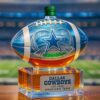 Dallas Cowboys America's Team Football Championship Whiskey Bottle finished with a simple green screw cap closure