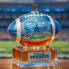 Dallas Cowboys America's Team Football Championship Whiskey Bottle with a detailed bronze cowboy riding a horse topper