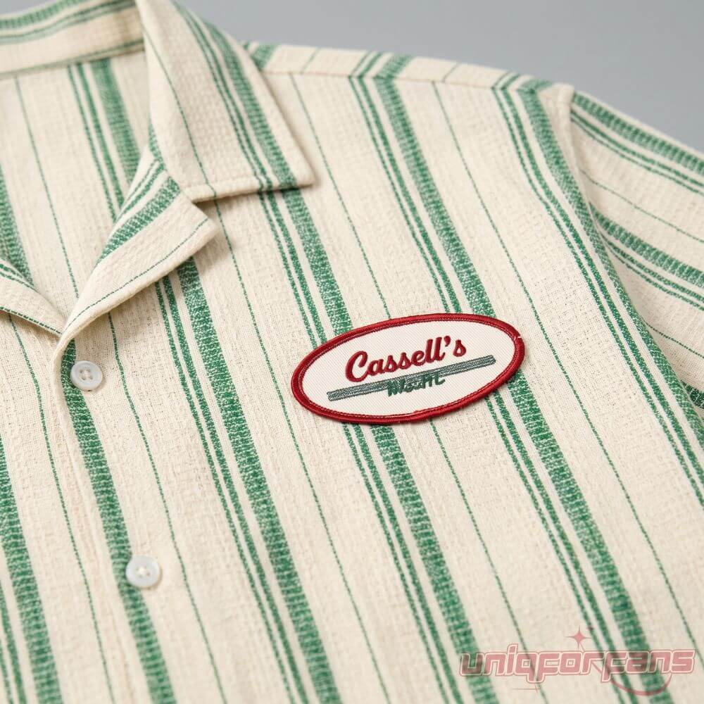 Obsession Movie Cassells Music Shirt Worn by Bear in Curry Barker's Film with green stripes and a chest oval patch logo