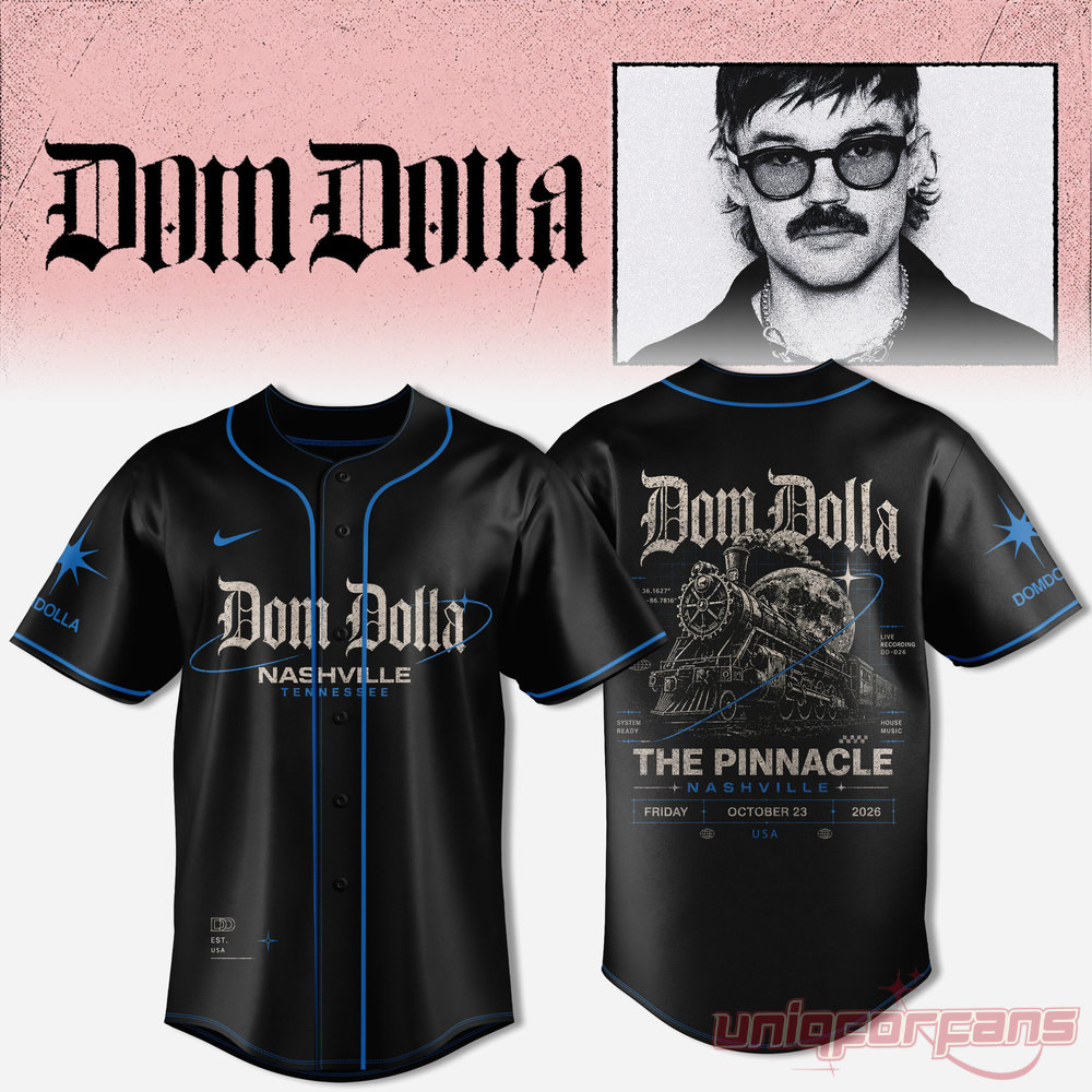 Dom Dolla Tour 2026 black baseball jersey with blue piping, Nashville front graphic, and train Pinnacle back graphic