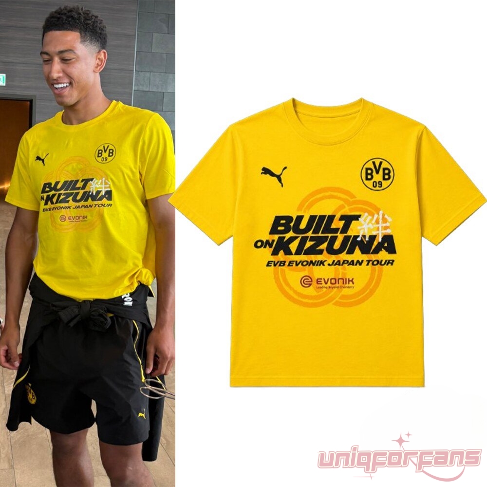 Jobe Bellingham Built on Kizuna BVB Evonik Japan Tour Shirt – yellow Puma tee with BVB crest, worn by Jobe Bellingham on tour