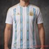 Messi Gold Stripe Argentina Jersey 39th Birthday edition, on-body front view showcasing the white and gold fit