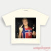 Norway Team Retro Soccer Supporter T-Shirt in cream, displaying a graphic print of a Norway national player