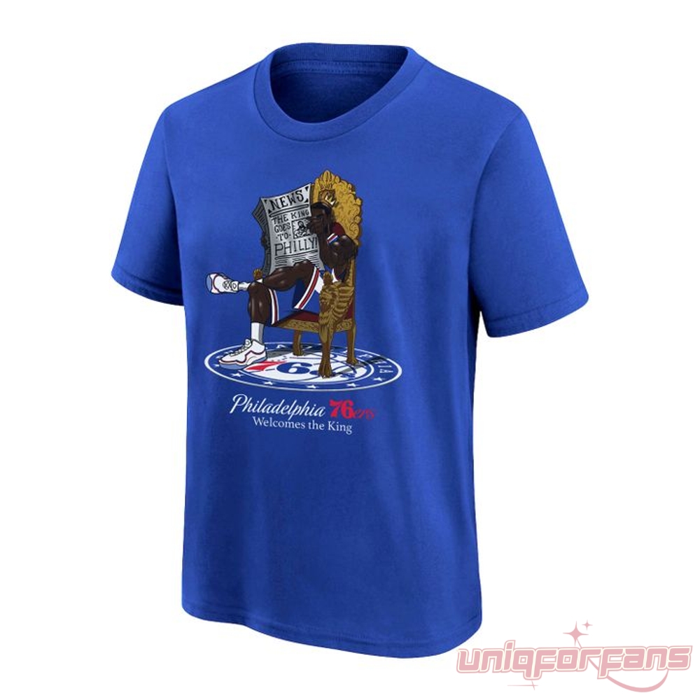 Philadelphia 76ers Welcomes the King LeBron James Number 23 T-Shirt front view in blue with king on throne reading newspaper.