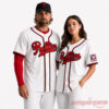 Phillies Field Of Dreams 2026 Jersey modeled by a man and woman in white shirts with red script logo