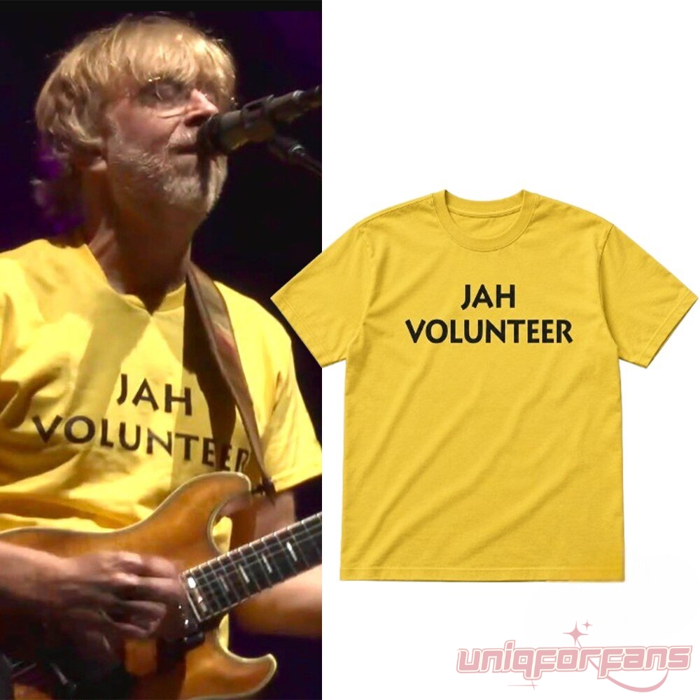 Phish Trey Anastasio Jah Volunteer 2026 Inspired Tee – yellow cotton tee with bold black Jah Volunteer text, as worn on stage