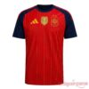 Spain FIFA World Cup 2026 Champions Jersey front view in red and navy featuring FIFA badge and team crest