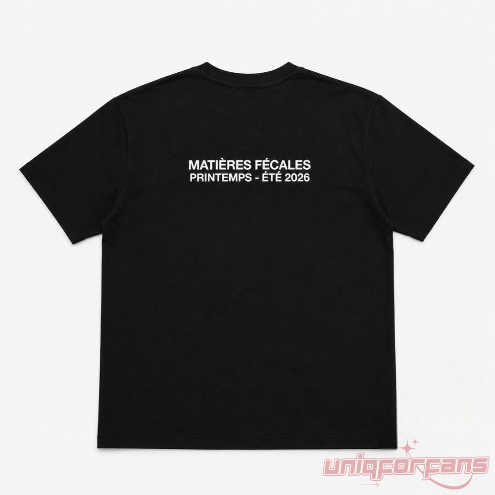 ADAM LAMBERT Matieres Fecales Printemps Ete 2026 black t-shirt back view showing white text logo.