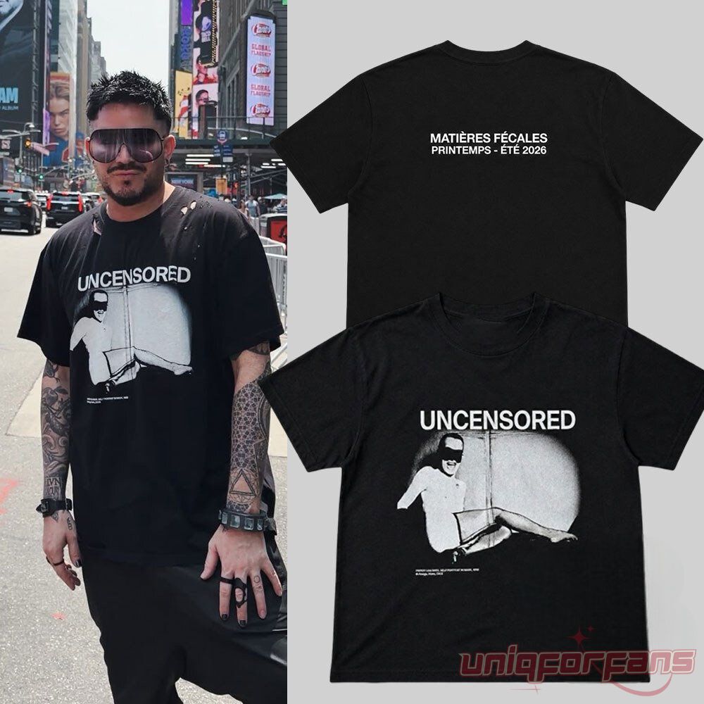 ADAM LAMBERT Matieres Fecales Printemps Ete 2026 black graphic t-shirt product mockup beside Adam Lambert wearing it.