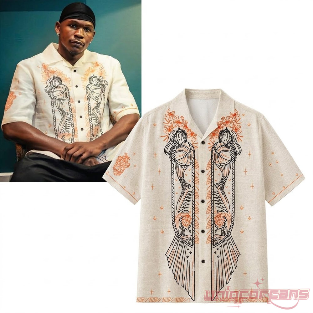 Anthony Edwards wearing a cream linen camp shirt featuring embroidered abstract basketball graphics and orange floral accents