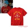 BTS V Kim Taehyung Gold's Gym red graphic t-shirt with yellow text and bodybuilder weightlifting graphic