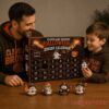 Cleveland Browns Football Halloween 2026 Advent Calendar being opened by a father and son wearing Browns hoodies