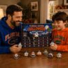 Florida Gators Football Halloween 2026 Advent Calendar opened by a father and son wearing Gators team hoodies