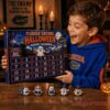 Florida Gators Football Halloween 2026 Advent Calendar held by an excited young fan wearing a blue team hoodie