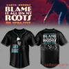 Garth Brooks Blame It All On My Roots baseball jersey in black with blue piping, featuring a cowboy hat portrait