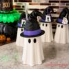 Halloween Ghost Witch Hat Tumbler Straw Cup white ceramic ghost shaped cups displayed on a marble kitchen counter