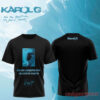 Karol G No Me Arrepiento Black T-Shirt featuring boxed anime eye graphic with blue metallic title text and signature logo