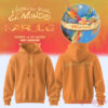 Karol G Bright Orange Hoodie featuring small chest logo print and stylized 