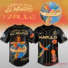 Karol G Viajando Por El Mundo Tropitour Black Baseball Jersey featuring tropical parrot and flower graphics with back globe portrait artwork