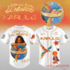 Karol G Viajando Por El Mundo Tropitour White Baseball Jersey featuring gold trim, colorful tropical graphics, and back globe portrait print