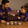 LSU Tigers Football Halloween 2026 Advent Calendar held by a father and son wearing purple Tigers hoodies