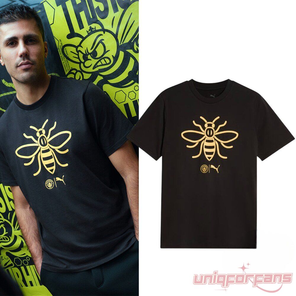 Manchester City Rodrigo ftblCulture Bee Shirt in black, featuring a yellow Manchester bee graphic and Puma club crest logo
