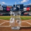 New York Yankees Glass Bear Logo Cap Tumbler With Straw empty clear glass bear tumbler on Yankee Stadium field background