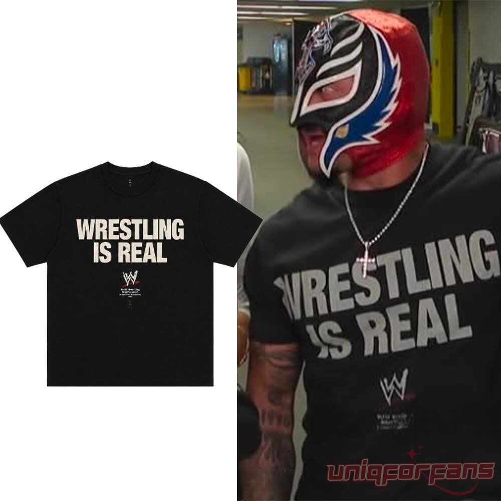 WWE Rey Mysterio "Wrestling Is Real" Graphic T-Shirt in black, featuring bold front block typography and scratch WWE logo